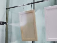 Wood cabinet finishing application